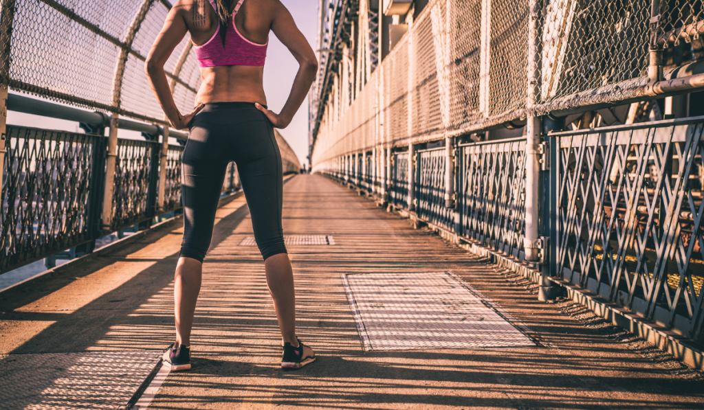 Woman runner on the Manhattan bridge

